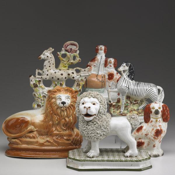 Appraisal: STAFFORDSHIRE Six animal figurines includes two spaniels two lions one