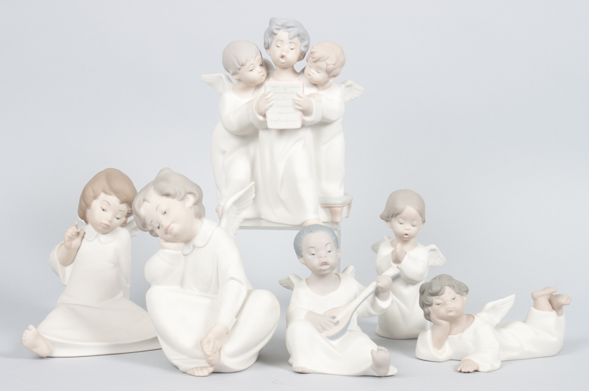 Appraisal: Six Lladro porcelain angels including choir group two recumbent angels