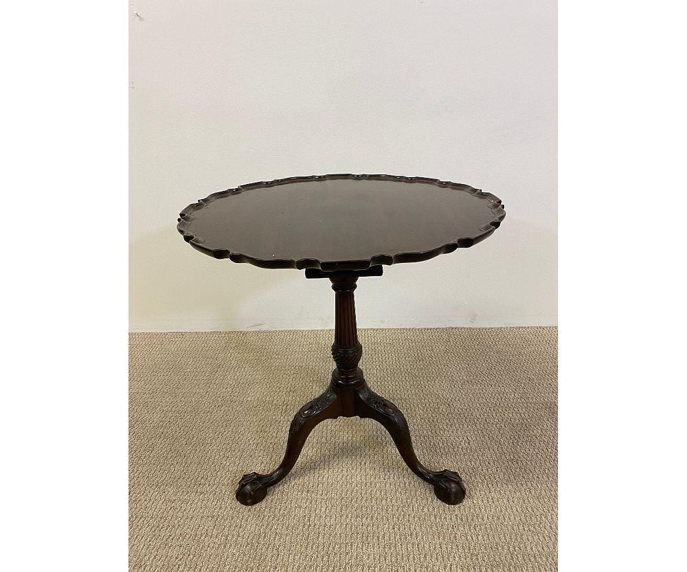 Appraisal: Chippendale Style Pie Crust Tea Table Chippendale style mahogany pie