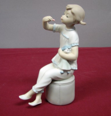 Appraisal: LLADRO - Girl with Doll - M Retired Good condition