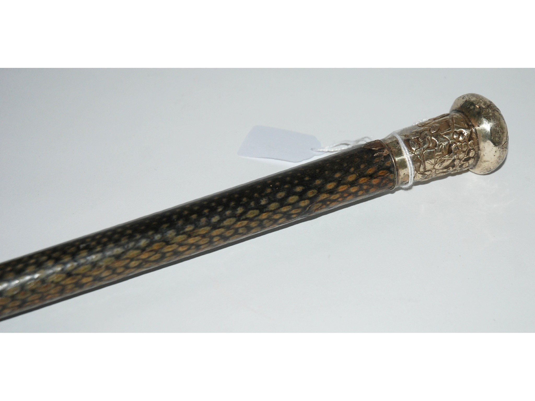 Appraisal: A Chinese silver topped walking cane decorated with snake skin