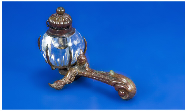 Appraisal: Round Glass Inkwell Held in a Talon This is an