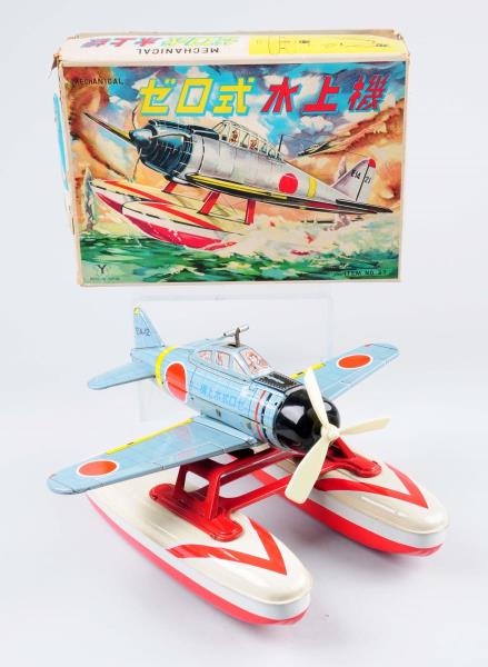 Appraisal: Japanese Tin Litho Mechanical Seaplane Toy Includes original box with