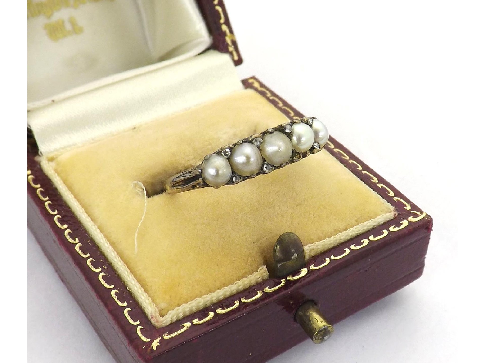 Appraisal: Claw set five stone cultured pearl and diamond ring in