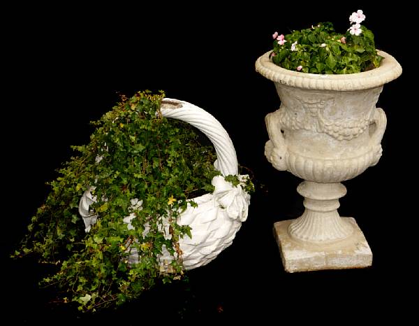 Appraisal: A collection of cast stone and paint decorated garden accessories