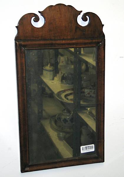 Appraisal: A George II mahogany mirror th century height in width