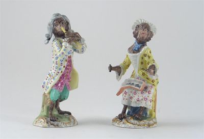 Appraisal: Two Meissen monkey musicians after the models by J J