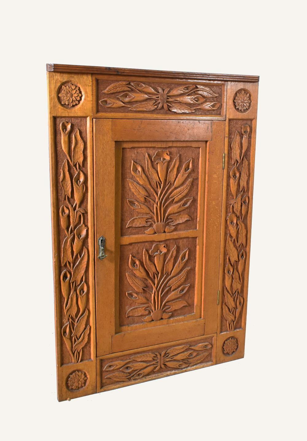 Appraisal: FOLIATE CARVED OAK HANGING CORNER CABINETEarly th Century English or