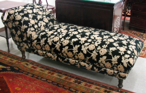 Appraisal: LATE VICTORIAN CHAISE LOUNGE American c with later floral tapestry