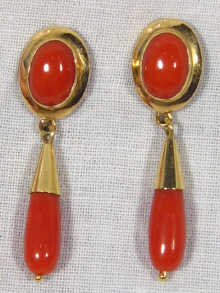 Appraisal: A pair of carat gold and coral drop earrings