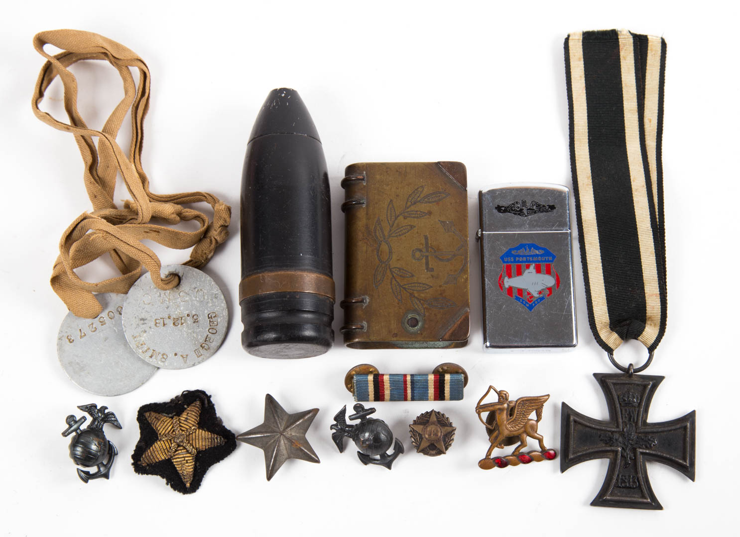 Appraisal: including trench art book badges lighter and mm shell