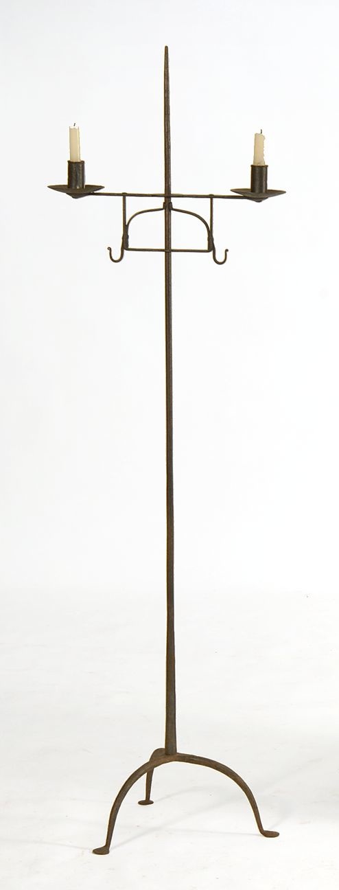 Appraisal: WROUGHT IRON FLOOR-STANDING DOUBLE CANDLE LAMP In Colonial style with