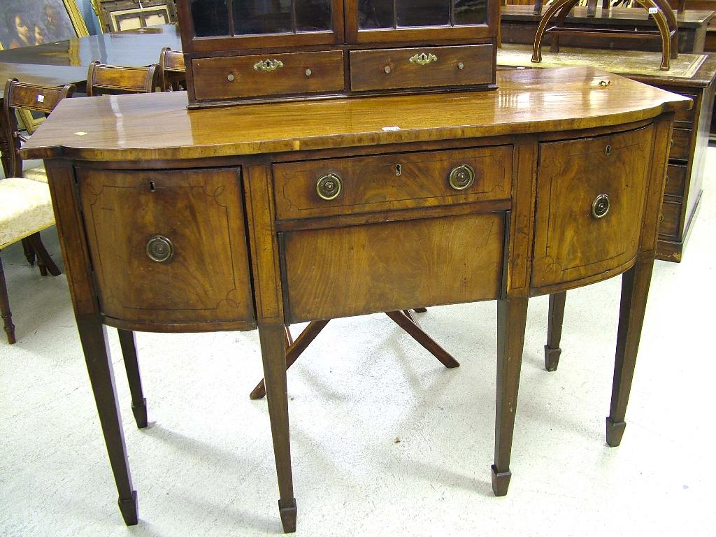 Appraisal: Regency mahogany bow front sideboard with an inlaid short drawer