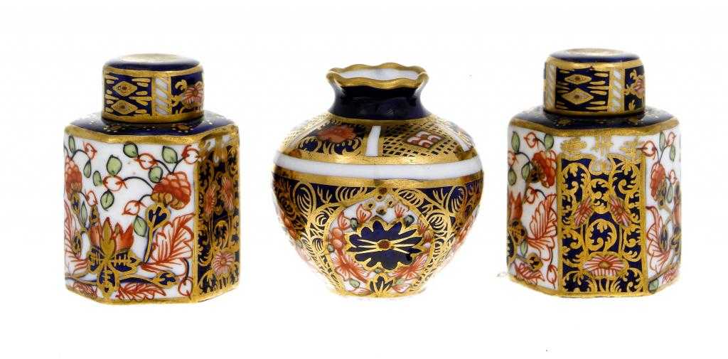 Appraisal: A PAIR OF ROYAL CROWN DERBY HEXAGONAL TOY TEA CANISTERS