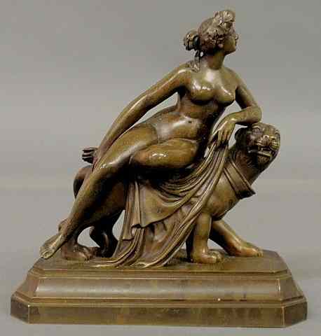 Appraisal: Bronze figure of a nude woman reclining on a leopard