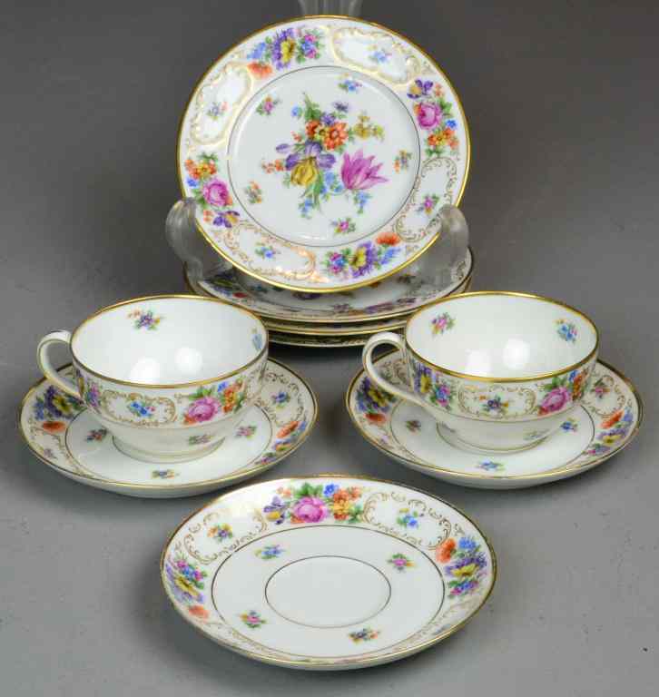 Appraisal: Bavarian Dresden Porcelain Cups SaucersBeautiful floral and gold Dresden Bavaria