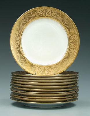 Appraisal: Set of twelve service plates ivory ground with elaborate gilt