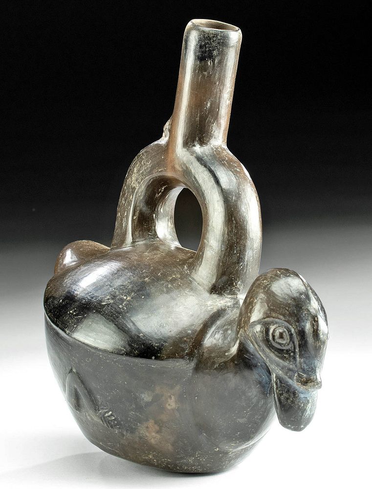 Appraisal: Chimu Blackware Duck Effigy Stirrup Vessel w Monkey Originally Listed