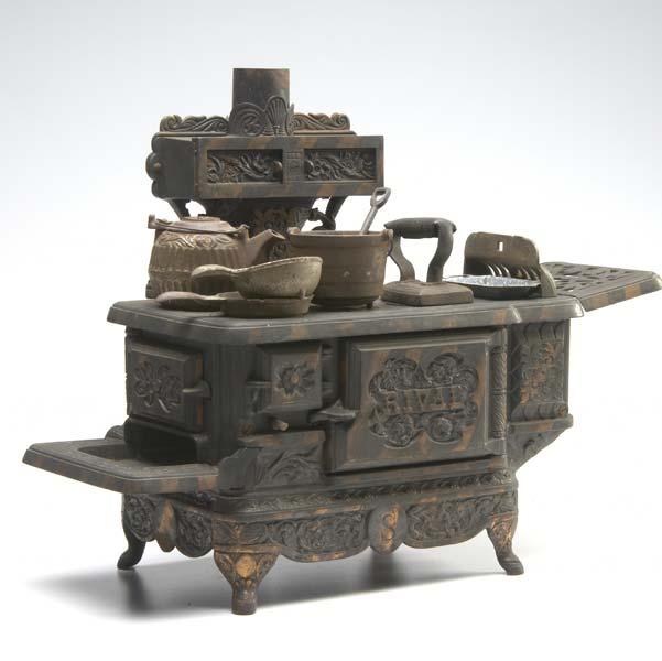 Appraisal: RIVAL CAST IRON CHILD S STOVE With additional accessories including