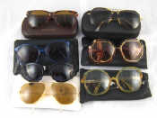 Appraisal: Seven pairs of designer sunglasses including examples by Versace Armani