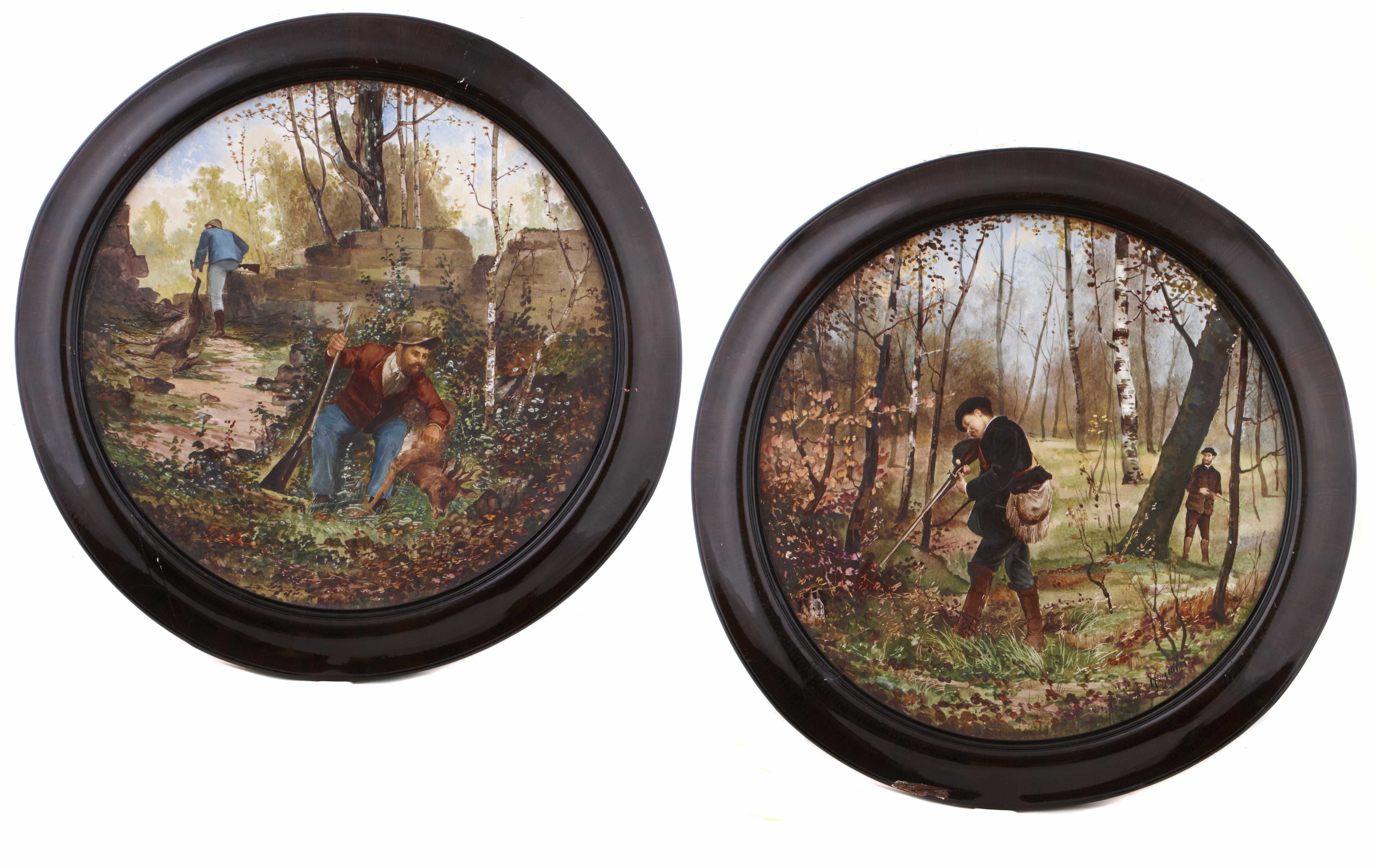 Appraisal: A pair of Continental painted earthenware circular plaques Each depicting