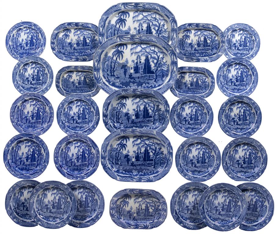 Appraisal: A BLUE PRINTED EARTHENWARE CHINOISERIE RUINS PATTERN DINNER SERVICE the