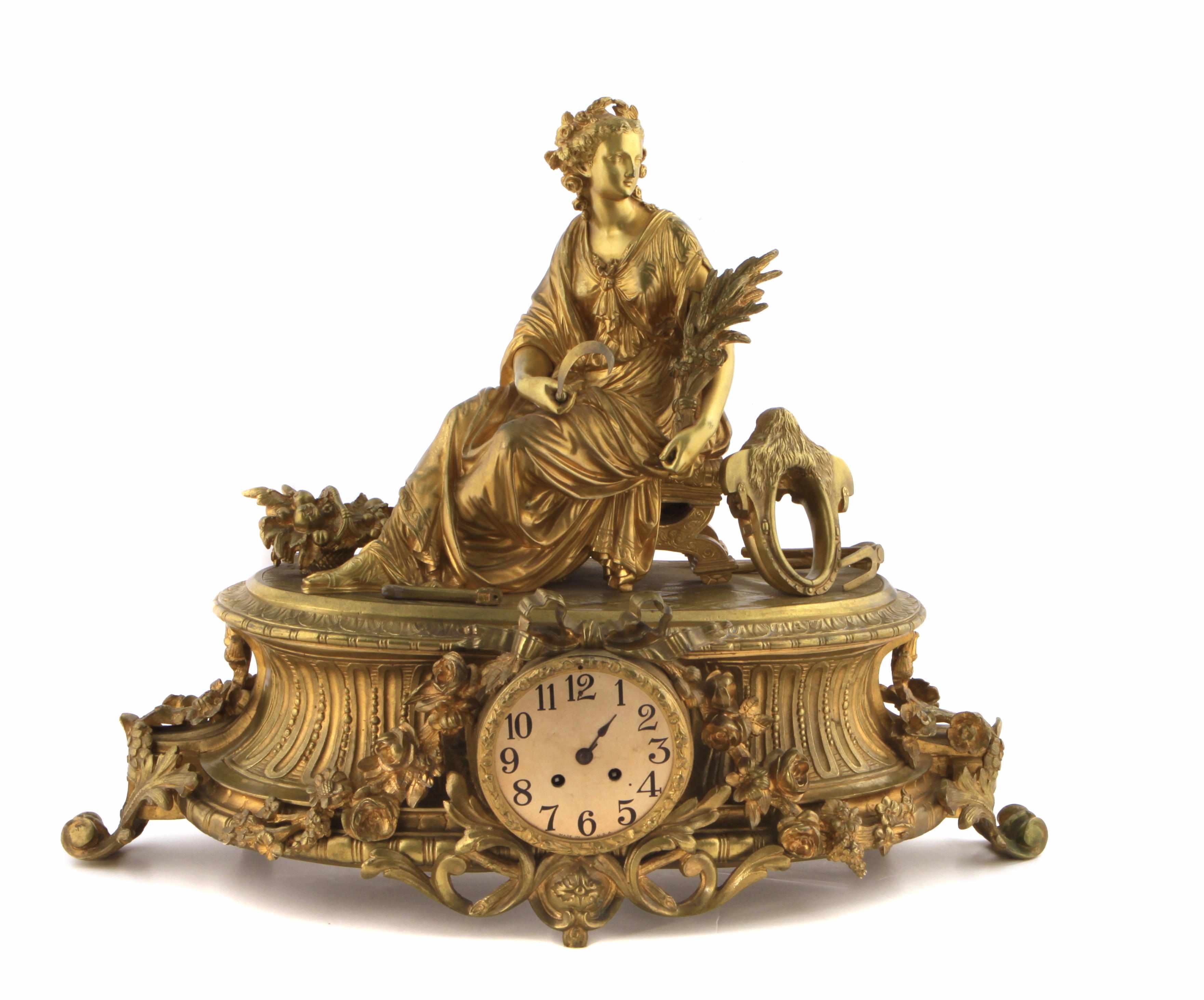 Appraisal: A Louis XVI style gilt bronze mantel clock emblematic of