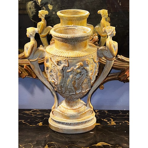 Appraisal: Cast composite Empire Revival urn with female term handles approx