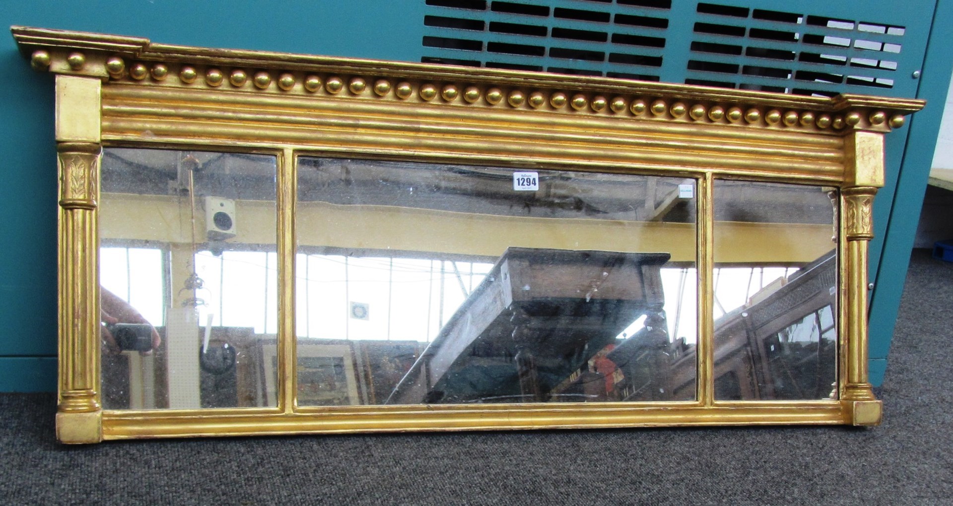 Appraisal: A th century gilt framed triple plate overmantel mirror with