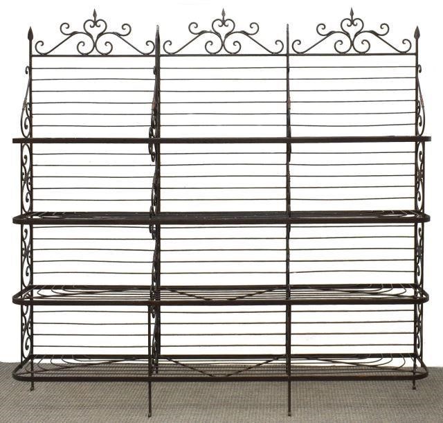 Appraisal: Large wrought iron baker's rack with four open shelves supported