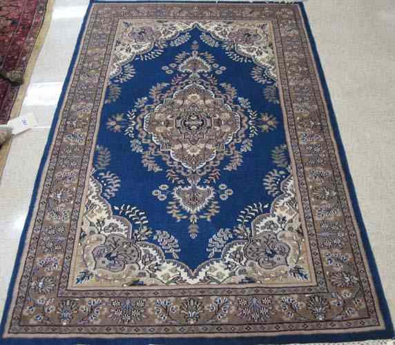 Appraisal: TWO HAND KNOTTED ORIENTAL AREA RUGS Indo-Persians floral and central