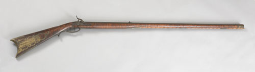 Appraisal: Pennsylvania long rifle with a percussion mechanism engraved J K