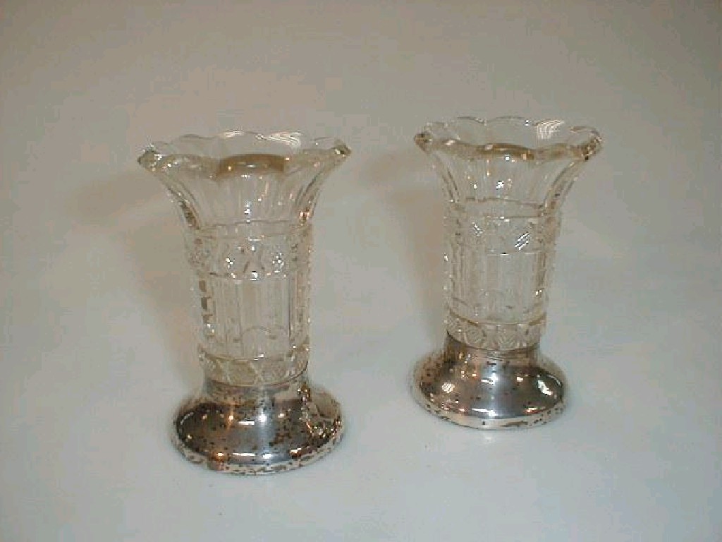 Appraisal: A pair of George V cut glass and silver vases