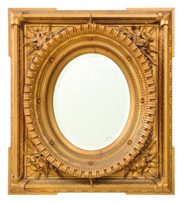 Appraisal: A GILTWOOD FRAMED BEVEL-EDGED WALL MIRROR WITH A PROJECTING OVAL