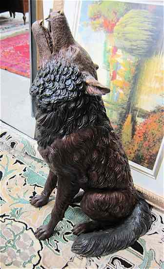 Appraisal: PATINATED BRONZE WILDLIFE SCULPTURE the study of a timber wolf