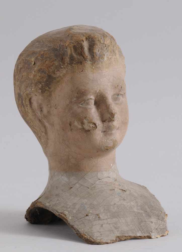 Appraisal: PAPIER-M CH BUST OF A YOUNG BOY Provenance Property from