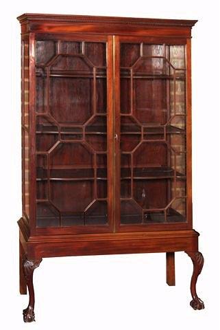 Appraisal: A LATE VICTORIAN CHIPPENDALE STYLE DISPLAY CABINET the interior fitted