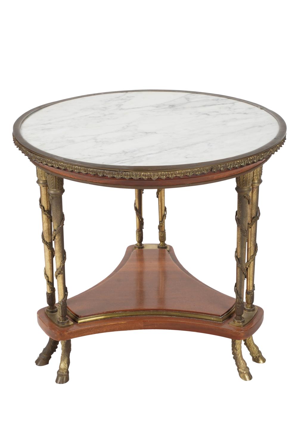 Appraisal: NEOCLASSICAL STYLE MAHOGANY GILT METAL SIDE TABLEthe round marble-inset top