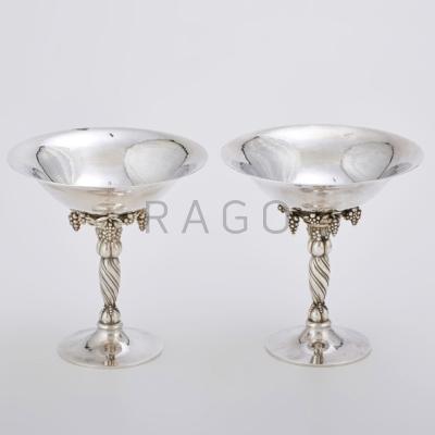 Appraisal: PAIR OF GEORG JENSEN STERLING COMPOTES B Flared hammered bowls