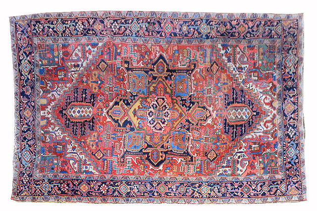 Appraisal: AN OLD HEREZ CARPET with polychrome polygonal panels within a