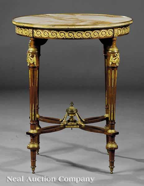 Appraisal: A Louis XVI-Style Gilt Bronze-Mounted Mahogany Gu ridon late th