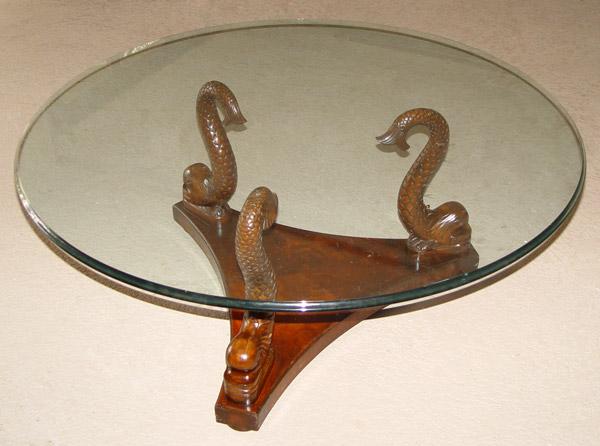 Appraisal: BEVAN FUNNELL DOLPHIN BASE COFFEE TABLE Solid mahogany glass top