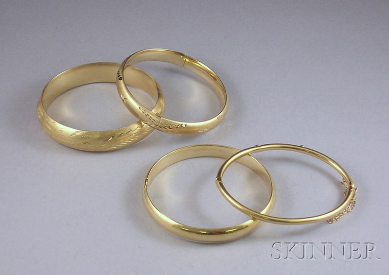 Appraisal: Three kt Gold Bangles one set with diamonds total dwt