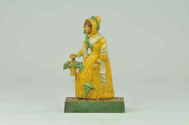 Appraisal: LADY WITH FLOWER BASKET PARASOL DOORSTOP BOOK EXAMPLE Bradley Hubbard