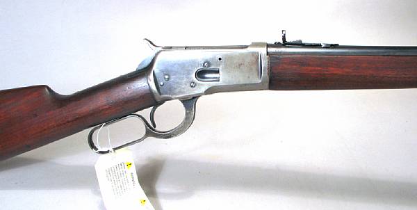 Appraisal: A Winchester Model saddle ring carbine with saddle scabbard Serial