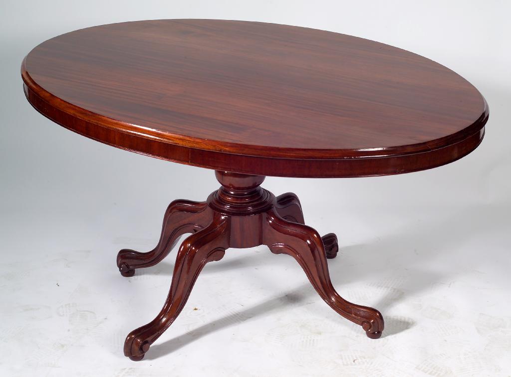 Appraisal: VICTORIAN MAHOGANY LOO TABLE the oval moulded tilt-top above a