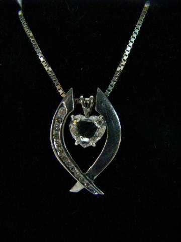 Appraisal: k white gold pendant with approximately ct heart-shaped diamond and