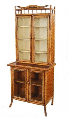 Appraisal: A late Victorian bamboo and lacquer cabinet having two pairs