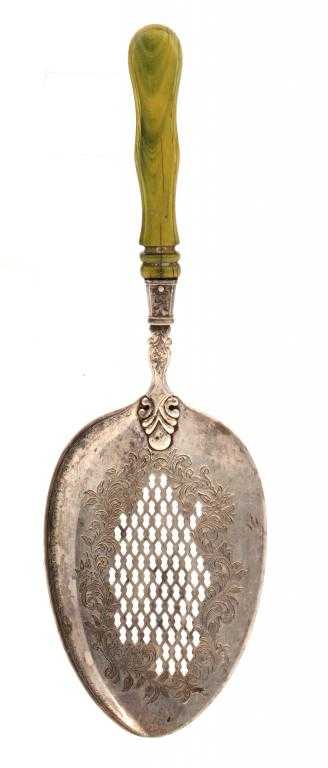 Appraisal: A DUTCH FISH SLICE with trellis piercing in an engraved