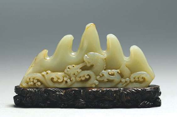 Appraisal: MING-STYLE JADE BRUSHREST Chinese Ming-style carved celadon jade brushrest of